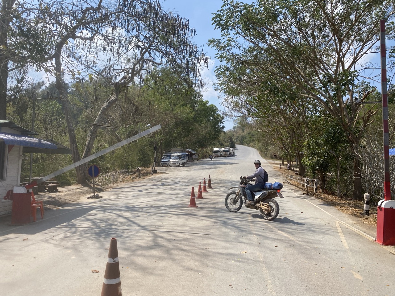 Motorcycle exiting Laos at the sleepy Huai Kon / Muang Ngeun border crossing in Nan province