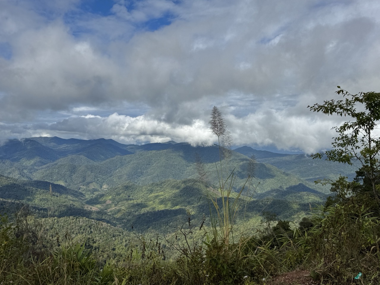 Cloudy mountain ridges on the road into the Mekong valley