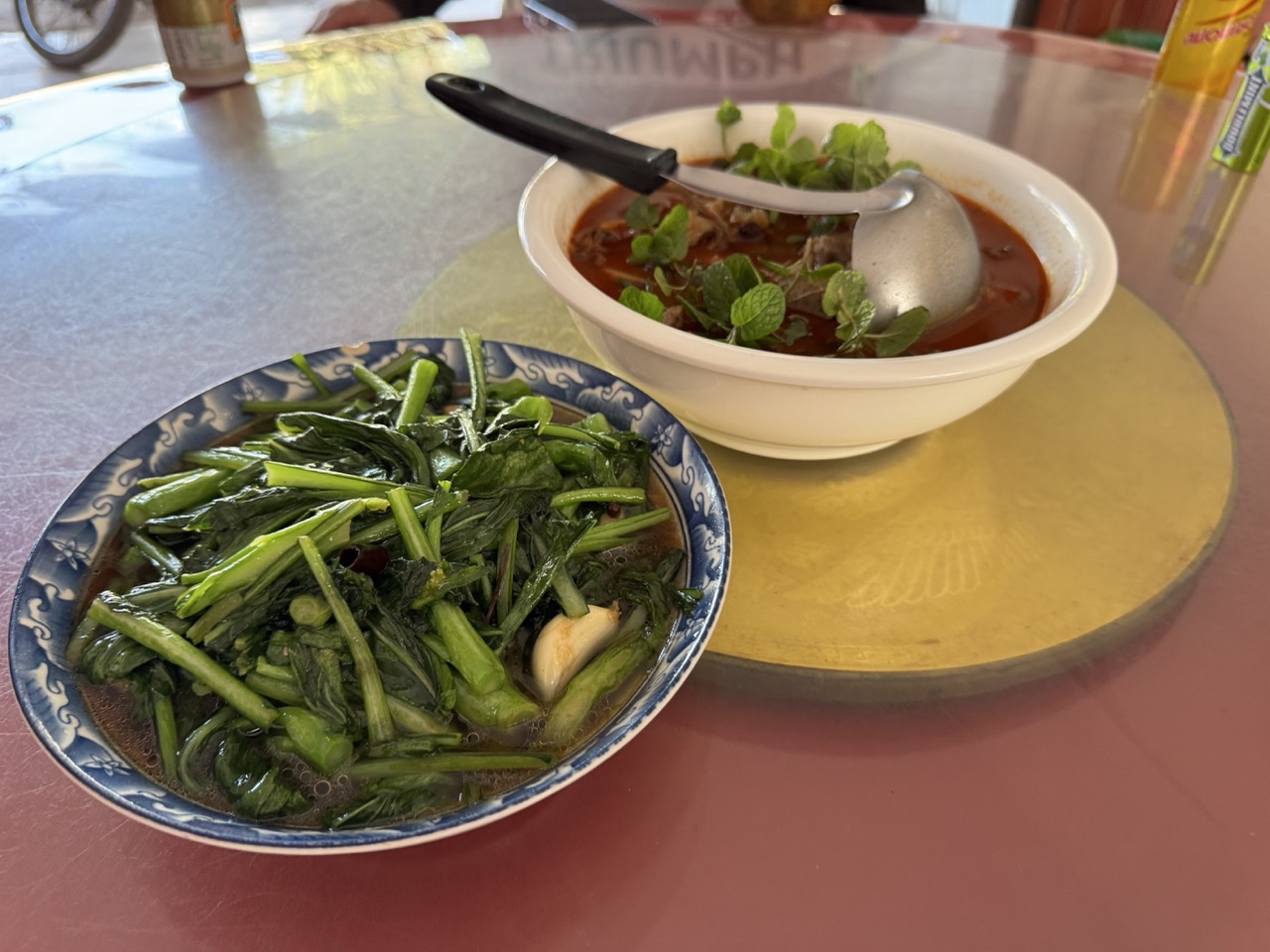 A bowl of noodle soup at a roadside stall in Oudomxay